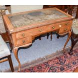 A Crossbanded Mahogany Leather Inset Writing Table, 92cm by 51cm by 73cm