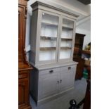 A Grey Painted Bookcase Cabinet, with glazed upper-section, 123cm by 51cm by 217cm