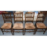 A Set of Four Oak Rush Seated and Spindle Back Chairs, 19th century