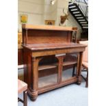 A Mahogany Chiffonier, 19th century, with glazed doors and cylindrical column supports, 127cm by