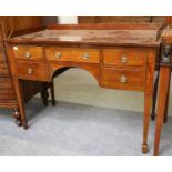 A Mahogany Writing Table, 19th century, with gallery top, tapering square section legs and spade