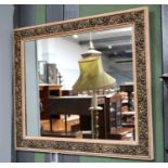 A Carved and Gilt Framed Mirror, 82cm by 71cm