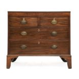 A George III Mahogany and Boxwod-Strung Straight Front Chest, early 19th century, the moulded top