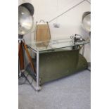A Modern Glass Top Desk, formed from a section of a Lynx helicopter, 166cm by 72cm by 81cm A