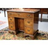 A Burr Walnut Kneehole Desk of Small Proportions, 19th century, 86cm by 43cm by 71cm