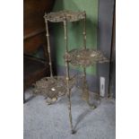 A Victorian Brass Three-Tier Stand, decorated with butterflies, 78cm highNo breaks or repairs, has
