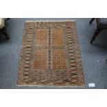 A Kuba Rug, the indigo field with two rows of stylised flowerheads enclosed by Harshang borders,