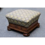 A Mahogany Footstool, 19th century, of square form, on flattened bun feet