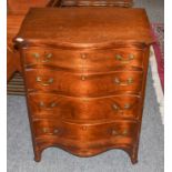 A Small Mahogany Four-Height Chest, 19th century, with serpentine front, 59cm by 42cm by 74cm