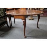 An early 20th century Dropleaf Table, on shell carved supports and pad feet, 128cm (open) by 97cm by