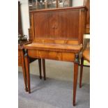 A Regency Mahogany Desk, the upper section with two tambour doors above a pair of drawers, flanked