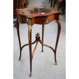An Edwardian Mahogany Gilt Metal Mounted Bijouterie TableA few scuffs and marks to the top. No key