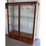 A Glazed Oak Shop Display Cabinet, 54cm by 137cm by 168cm