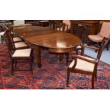 A Mahogany Extending Dining Table, late 19th/early 20th century, with two additional leaves,