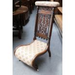 A Mahogany Framed Prie Dieu, 19th century, the pierced back above a slipper seat