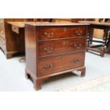 A Small George III style Mahogany Three-Height Straight Front Chest Of Drawers, raised on bracket