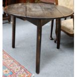An Oak Circular Table, of cricket type, 91cm by 72cmA 1920's Circular Folding Table, with