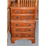 A Small Reproduction Yew Wood Five Height Chest, 44cm by 32cm by 71cm