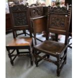 Two 18th Century Carved and Panelled Hall Chairs, with turned supports