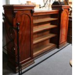 A Mahogany Breakfront Bookcase, with associated stand, 197cm by 39cm by 129cm