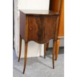 A Mahogany Bedside Cupbord, with serpentine front, 41cm by 36cm by 73cm