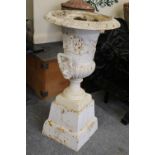 A Pair of Victorian White Painted Cast Iron Campana Form Garden Urns, each with egg and dart