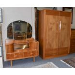 A 1960's Teak Bedroom Suite, comprising: dressing table, 107cm by 49cm by 150cm, double wardrobe,