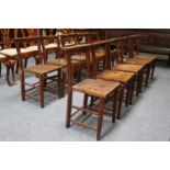 A Set of Ten Oak and Elm Chapel Chairs