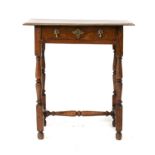 An Oak Side Table, 18th century, with turned and block supports and stretchers 63cm by 44cm by 69cm