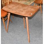 A Light Elm Ercol Table, raised on three legs, 75cm by 51cm by 72cmA Set of Four Ercol Elm Spindle