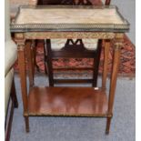 A French Empire Style Gilt Metal Mounted Kingwood Side Table, with brass gallery, marble top and