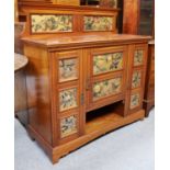 An Aesthetic Style Side Cabinet possibly Gillows, the upstand and drawer fronts applied with hand-