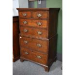 A Small Oak Chest, with two short over four long drawers, 65cm by 46cm by 111cmThe top separating