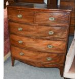 A Late Georgian Mahogany Bowfront Chest, with two short over three long drawers with cock beading