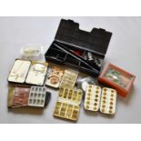 A Collection Of Various Fly Boxes And Accessories
