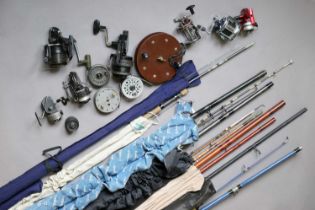 A Collection Of Rods And Reels