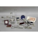 A Collection of Assorted Silver, including dressing-table items; a sauceboat; various photograph-