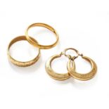 A 22 Carat Gold Band Ring, finger size L; A 9 Carat Gold Band Ring, finger size L1/2; and A Pair