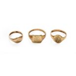 Three 9 Carat Gold Signet Rings, finger sizes G1/2, O1/2 and SGross weight 9.6 grams.