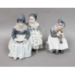 Royal Copenhagen, figure group model No. 1395, 18cm h and a further figure, model No. 1314, 15cm