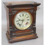 A German Walnut Striking Mantel Clock, circa 1890, twin barrel movement stamped W & H, 30cm high,