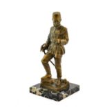 German School (late 19th/early 20th century): A Bronze Figure of a Saxon Miner, standing, holding