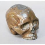 A Small Bronzed Lead Skull, 20th century, 5cm