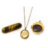 A 9 Carat Gold Hardstone Swivel Fob; A Tiger's-Eye Bar Brooch, stamped '9CT', length 4.3cm; and A