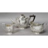 A Three-Piece Victorian Silver Tea-Service, by Charles Stuart Harris, London, 1900, each piece