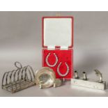 A Collection of Assorted Silver and Silver Plate, the silver including a seven-bar toastrack and a