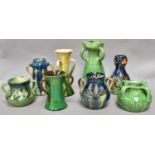 A Collection of Arts & Crafts Pottery Vases, decorated in coloured glazes, including Watcombe and