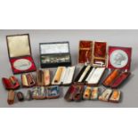 A Collection of Assorted Silver or Gold-Mounted Cigarette-Holders, most in original or associated