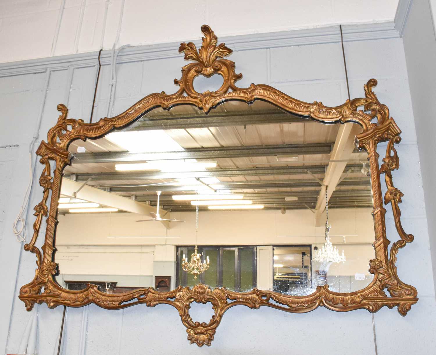 A 19th Century Gilt and Gesso Overmantel Mirror, in the Chippendale style, 115cm by 98cm; together