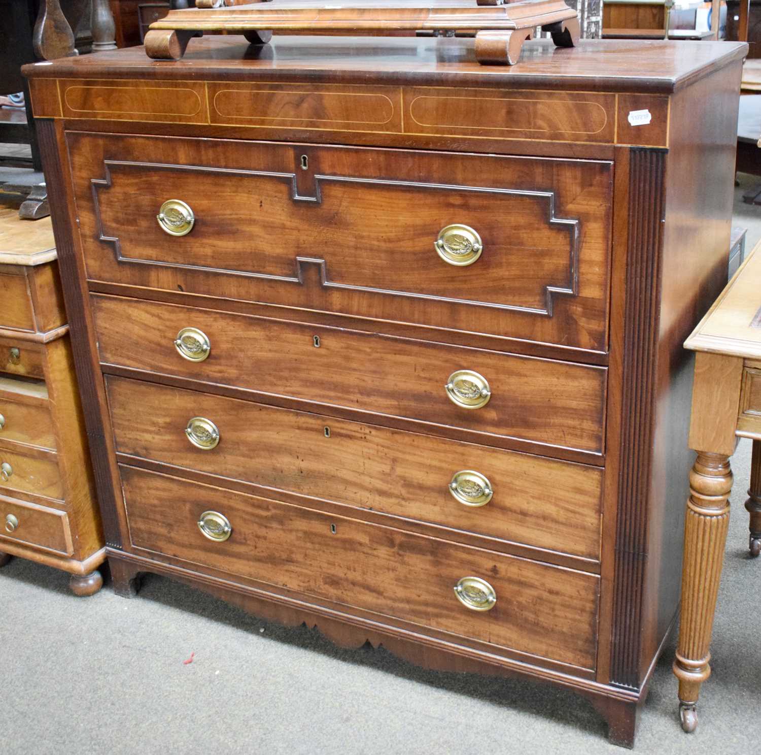 A Regency Mahogany Secretaire Chest, with strung inlay, fluted side supports, fitted interior, and